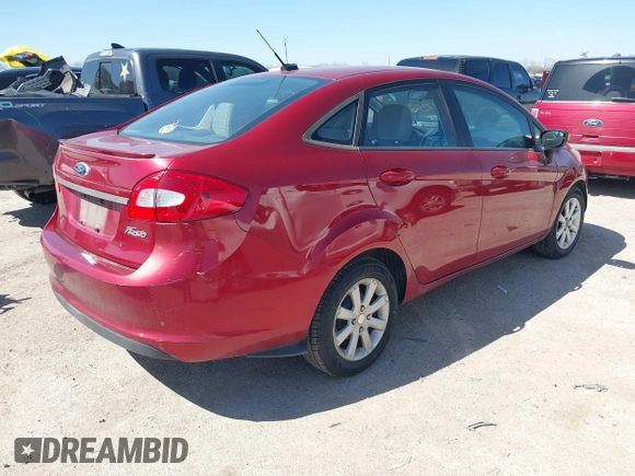 2013 Ford Fiesta SE z VIN 3FADP4BJ0DM107682, wystawiony jako IAAI lot #41772631 z przebiegiem 146 760 mil mil oraz . Historia ofert i sprzedaży dostępna na DreamBid. Obrazek 4.