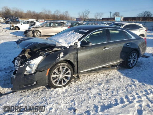 2014 Cadillac XTS with VIN 2G61L5S37E9185986, listed as a Copart auction lot 45142685 with 61,940 mi miles and Salvage Title. Bid and sale history available at carsss.com. Image 1.