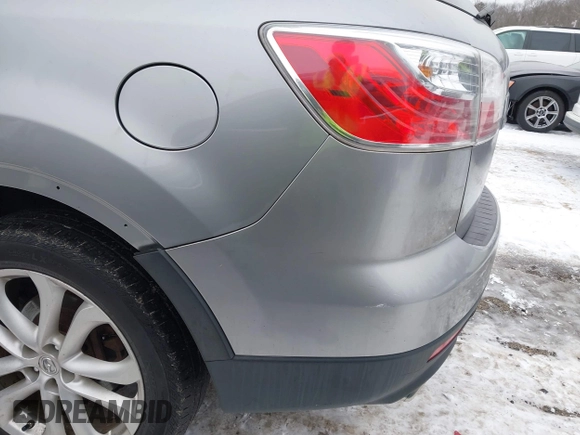 2012 Mazda CX-9 Grand Touring with VIN JM3TB3DV2C0353558, listed as a IAAI auction lot 41397266 with 158,843 mi miles and . Bid and sale history available at DreamBid. Image 16.