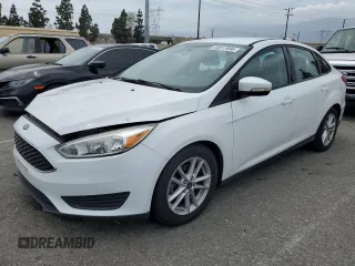 2016 Ford Focus SE with VIN 1FADP3F20GL290276, listed as a Copart auction lot 56517805 with 115,736 mi miles and Salvage title. Bid and sale history available at DreamBid. Image 1.