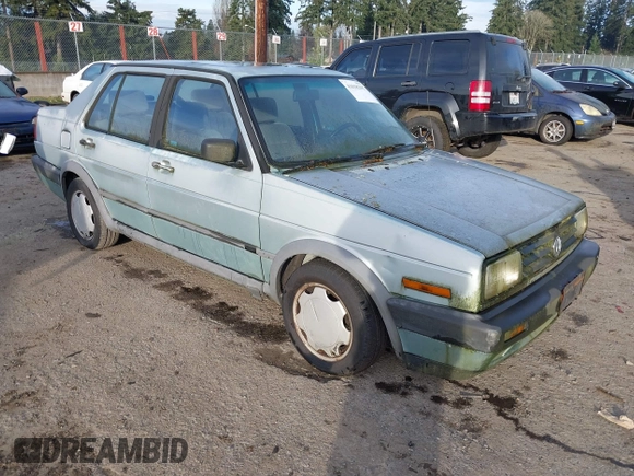 1991 Volkswagen Jetta z VIN 3VWRB21G1MM017401, wystawiony jako IAAI lot #41018295 z przebiegiem 206 316 mil mil oraz . Historia ofert i sprzedaży dostępna na DreamBid. Obrazek 1.