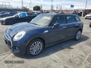 2017 MINI Clubman Cooper S with VIN WMWLN9C56H2E49130, listed as a Copart auction lot 49128295 with 28,202 mi miles and Salvage Title. Bid and sale history available at carsss.com. Image 1.