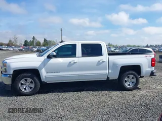 2016 Chevrolet Silverado 1500 LT with VIN 3GCUKREC1GG278916, listed as a IAAI auction lot 41799147 with 123,217 mi miles and . Bid and sale history available at DreamBid. Image 14.