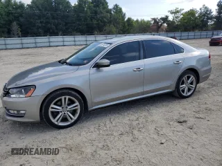 2014 Volkswagen Passat SEL Premium with VIN 1VWCT7A31EC017706, listed as a Copart auction lot 65974315 with 197,922 mi miles and Clean title. Bid and sale history available at DreamBid. Image 1.
