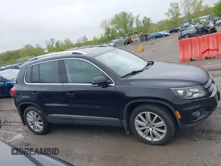 2016 Volkswagen Tiguan S with VIN WVGBV7AX3GW519044, listed as a IAAI auction lot 42058245 with 96,915 mi miles and . Bid and sale history available at DreamBid. Image 13.
