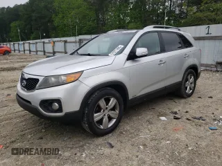 2012 Kia Sorento EX z VIN 5XYKUDA29CG305595, wystawiony jako Copart lot #57077495 z przebiegiem 143 922 mil mil oraz Szkoda całkowita • Salvage title. Historia ofert i sprzedaży dostępna na DreamBid. Obrazek 1.