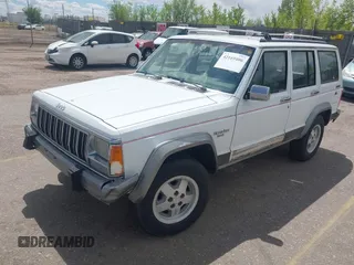 1992 Jeep Cherokee with VIN 1J4FJ58S0NL102716, listed as a IAAI auction lot 42169406 with 197,167 mi miles and . Bid and sale history available at DreamBid. Image 2.