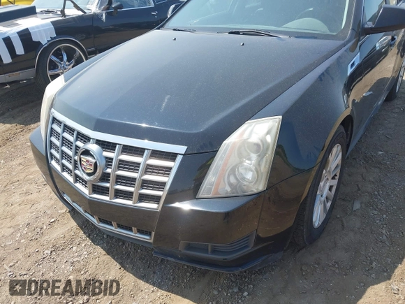 2012 Cadillac CTS z VIN 1G6DC5E52C0142318, wystawiony jako IAAI lot #42413205 z przebiegiem 100 694 mil mil oraz . Historia ofert i sprzedaży dostępna na DreamBid. Obrazek 6.