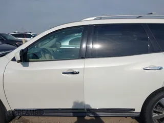 2015 Nissan Pathfinder Platinum with VIN 5N1AR2MN3FC641223, listed as a IAAI auction lot 42013024 with 148,673 mi miles and . Bid and sale history available at DreamBid. Image 15.