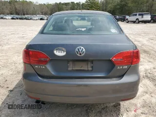 2011 Volkswagen Jetta Sedan SE with VIN 3VWDX7AJ7BM326243, listed as a Copart auction lot 50886835 with 165,059 mi miles and Salvage Title. Bid and sale history available at carsss.com. Image 6.
