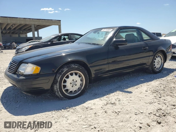 1997 Mercedes-Benz SL 500 z VIN WDBFA63F4VF151890, wystawiony jako Copart lot #53715385 z przebiegiem 165 459 mil mil oraz Czysty tytuł • Clean title. Historia ofert i sprzedaży dostępna na DreamBid. Obrazek 1.