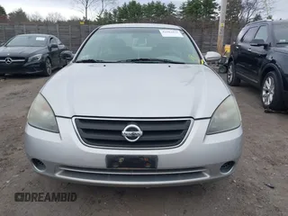 2003 Nissan Altima S with VIN 1N4AL11D33C265538, listed as a IAAI auction lot 42082079 with 180,138 mi miles. Bid and sale history available at carsss.com. Image 6.