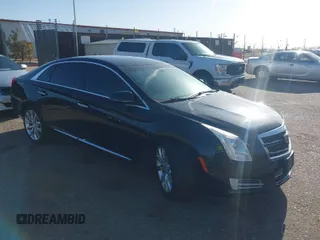 2016 Cadillac XTS Luxury Collection with VIN 2G61N5S33G9210010, listed as a IAAI auction lot 41981841 with 229,717 mi miles. Bid and sale history available at carsss.com. Image 1.