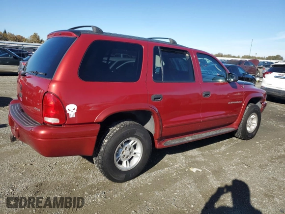 2001 Dodge Durango z VIN 1B4HS28Z61F579891, wystawiony jako Copart lot #80510284 z przebiegiem 186 180 mil mil oraz Czysty tytuł • Clean title. Historia ofert i sprzedaży dostępna na DreamBid. Obrazek 3.
