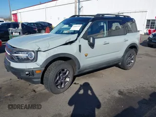 2024 Ford Bronco Sport Badlands z VIN 3FMCR9D9XRRE94327, wystawiony jako IAAI lot #41681554 z przebiegiem 8 050 mil mil oraz . Historia ofert i sprzedaży dostępna na DreamBid. Obrazek 2.