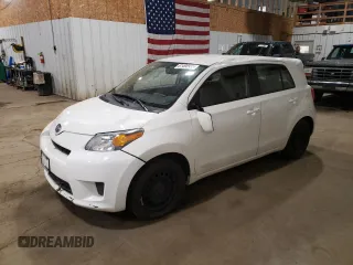 2014 Scion xD with VIN JTKKUPB48E1046627, listed as a Copart auction lot 61498995 with 63,452 mi miles and Salvage title. Bid and sale history available at DreamBid. Image 1.