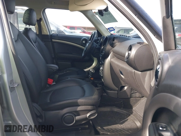 2015 MINI Countryman with VIN WMWZB3C56FWR46360, listed as a IAAI auction lot 41691359 with 88,305 mi miles and . Bid and sale history available at DreamBid. Image 5.