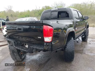 2017 Toyota Tacoma SR5 with VIN 5TFCZ5AN6HX076769, listed as a IAAI auction lot 41889869 with 208,894 mi miles. Bid and sale history available at carsss.com. Image 4.