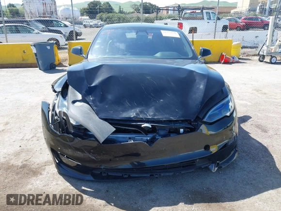 2022 Tesla Model S Plaid with VIN 5YJSA1E61NF483354, listed as a IAAI auction lot 41973636 with 32,541 mi miles and . Bid and sale history available at DreamBid. Image 12.