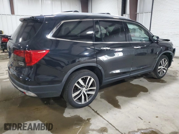 2017 Honda Pilot Touring with VIN 5FNYF6H96HB087634, listed as a Copart auction lot 63535125 with 137,129 mi miles and Salvage title. Bid and sale history available at DreamBid. Image 3.