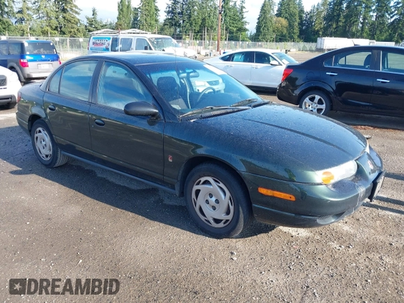 2000 Saturn SL z VIN 1G8ZK5271YZ165467, wystawiony jako IAAI lot #42367156 z przebiegiem 185 962 mil mil oraz . Historia ofert i sprzedaży dostępna na DreamBid. Obrazek 1.