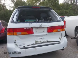 2004 Honda Odyssey EX-L with VIN 5FNRL18074B109717, listed as a IAAI auction lot 37731273 with 314,449 mi miles and . Bid and sale history available at DreamBid. Image 6.