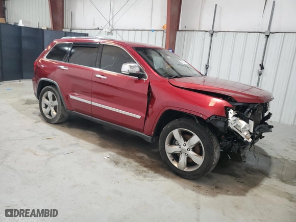 2012 Jeep Grand Cherokee Overland with VIN 1C4RJFCT4CC222024, listed as a Copart auction lot 49122225 with 143,063 mi miles and Clean Title. Bid and sale history available at carsss.com. Image 4.