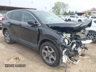 2018 Honda CR-V EX-L z VIN 7FARW2H80JE036791, wystawiony jako IAAI lot #42134046 z przebiegiem 89 523 mil mil oraz . Historia ofert i sprzedaży dostępna na DreamBid. Obrazek 1.