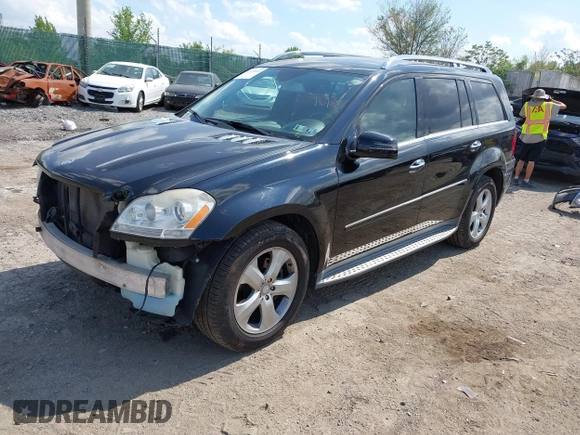 2012 Mercedes-Benz GL 450 z VIN 4JGBF7BE0CA778575, wystawiony jako IAAI lot #42171413 z przebiegiem 59 587 mil mil oraz . Historia ofert i sprzedaży dostępna na DreamBid. Obrazek 18.