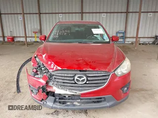 2016 Mazda CX-5 Touring with VIN JM3KE2CY0G0691927, listed as a IAAI auction lot 41611743 with 160,246 mi miles. Bid and sale history available at carsss.com. Image 12.