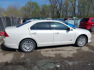2012 Ford Fusion Hybrid с VIN 3FADP0L31CR325835, выставлен на аукционе IAAI как лот 41982489 с пробегом 124 266 миль миль и . История ставок и продаж доступна на DreamBid. Изображение 13.