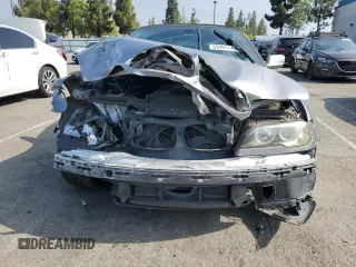 2004 BMW 3 Series 330Ci with VIN WBABW53414PL44756, listed as a Copart auction lot 59993145 with 105,596 mi miles and Salvage title. Bid and sale history available at DreamBid. Image 5.
