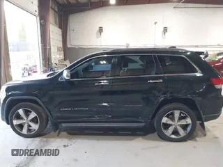 2014 Jeep Grand Cherokee Limited z VIN 1C4RJFBG2EC320282, wystawiony jako IAAI lot #42067273 z przebiegiem 78 061 mil mil oraz . Historia ofert i sprzedaży dostępna na DreamBid. Obrazek 6.