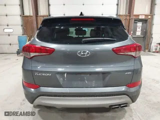 2018 Hyundai Tucson Value with VIN KM8J3CA22JU688957, listed as a IAAI auction lot 41868195 with 117,256 mi miles. Bid and sale history available at carsss.com. Image 16.