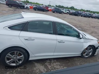 2018 Hyundai Sonata SEL with VIN 5NPE34AF8JH598317, listed as a IAAI auction lot 42214605 with 106,939 mi miles and . Bid and sale history available at carsss.com. Image 13.