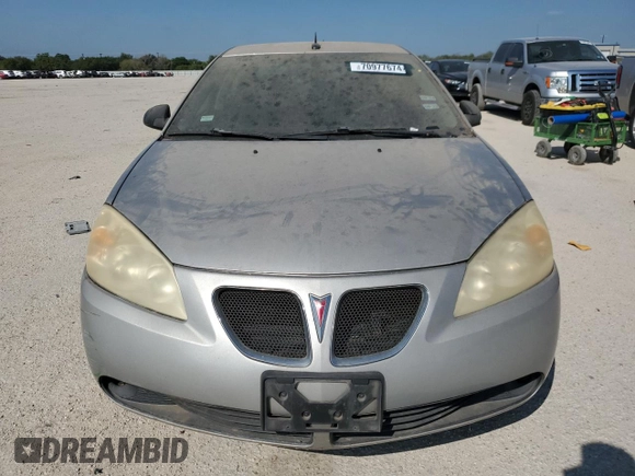 2008 Pontiac G6 z VIN 1G2ZG57N184198212, wystawiony jako Copart lot #70977674 z przebiegiem 118 154 mil mil oraz Czysty tytuł • Clean title. Historia ofert i sprzedaży dostępna na DreamBid. Obrazek 5.