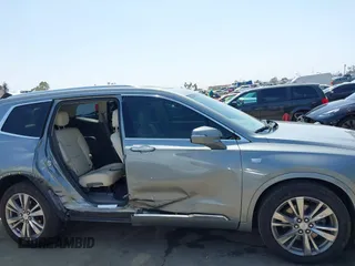 2023 Cadillac XT6 FWD Premium Luxury with VIN 1GYKPCRS6PZ163018, listed as a IAAI auction lot 42437403 with 21,366 mi miles and . Bid and sale history available at DreamBid. Image 14.