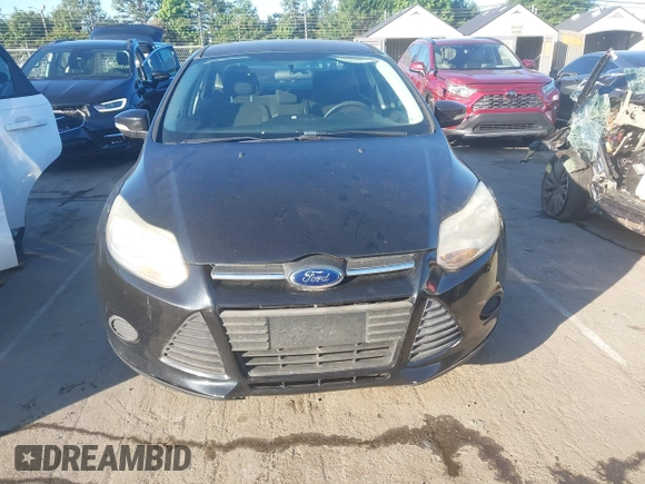2013 Ford Focus SE z VIN 1FADP3F29DL216818, wystawiony jako IAAI lot #42347855 z przebiegiem 138 921 mil mil oraz . Historia ofert i sprzedaży dostępna na DreamBid. Obrazek 6.