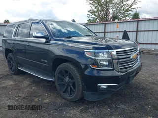 2015 Chevrolet Tahoe LTZ z VIN 1GNSKCKC6FR587148, wystawiony jako IAAI lot #42159967 z przebiegiem 205 176 mil mil oraz . Historia ofert i sprzedaży dostępna na DreamBid. Obrazek 1.