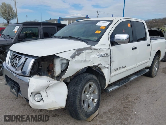 2011 Nissan Titan SL with VIN 1N6AA0EC7BN313599, listed as a IAAI auction lot 41888934 with 182,894 mi miles. Bid and sale history available at carsss.com. Image 2.