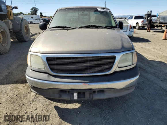 2003 Ford F-150 XL with VIN 1FTRX17L93NB77050, listed as a Copart auction lot 77107564 with 0 mi miles and Salvage Title. Bid and sale history available at carsss.com. Image 5.