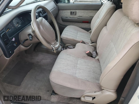 1998 Toyota Tacoma with VIN 4TAWN72N8WZ113174, listed as a Copart auction lot 84641064 with 148,221 mi miles and Salvage Title. Bid and sale history available at DreamBid. Image 7.