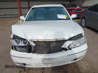 2007 Hyundai Azera SE with VIN KMHFC46F07A139369, listed as a IAAI auction lot 41999327 with 145,827 mi miles and . Bid and sale history available at DreamBid. Image 12.