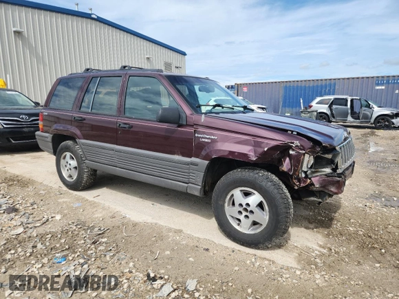 1994 Jeep Grand Cherokee Laredo z VIN 1J4GZ58S0RC221854, wystawiony jako Copart lot #61950825 z przebiegiem 69 465 mil mil oraz Czysty tytuł • Clean title. Historia ofert i sprzedaży dostępna na DreamBid. Obrazek 4.