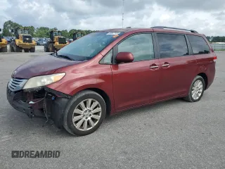 2011 Toyota Sienna XLE with VIN 5TDDK3DCXBS024257, listed as a Copart auction lot 60667145 with 283,609 mi miles and Salvage title. Bid and sale history available at DreamBid. Image 1.