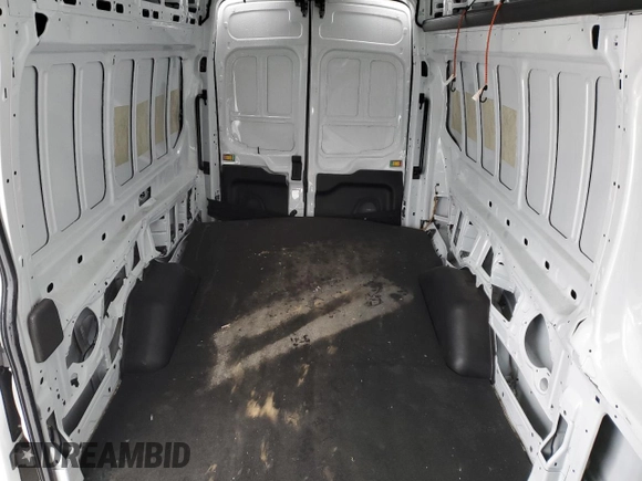2023 Ford Transit Cargo z VIN 1FTBW3U82PKB65152, wystawiony jako Copart lot #43433405 z przebiegiem 6 128 mil mil oraz Szkoda całkowita • Salvage title. Historia ofert i sprzedaży dostępna na DreamBid. Obrazek 10.