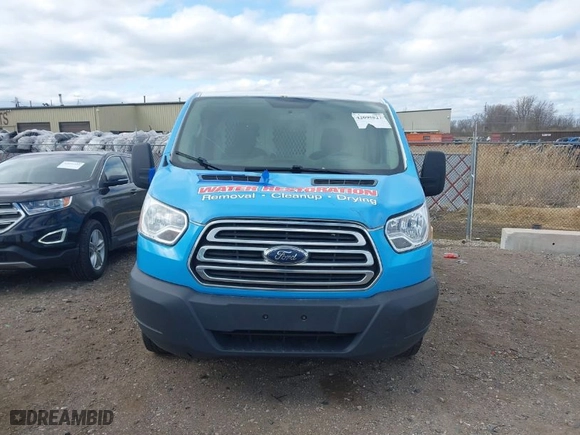 2015 Ford Transit Cargo Van with VIN 1FTNR1ZM9FKA60590, listed as a IAAI auction lot 42095827 with 252,192 mi miles. Bid and sale history available at carsss.com. Image 12.