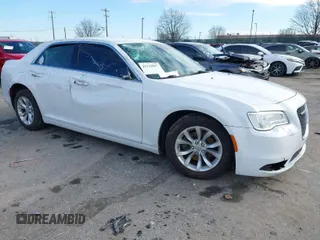 2015 Chrysler 300 Limited with VIN 2C3CCAAG8FH781252, listed as a IAAI auction lot 41138887 with 115,116 mi miles. Bid and sale history available at carsss.com. Image 1.