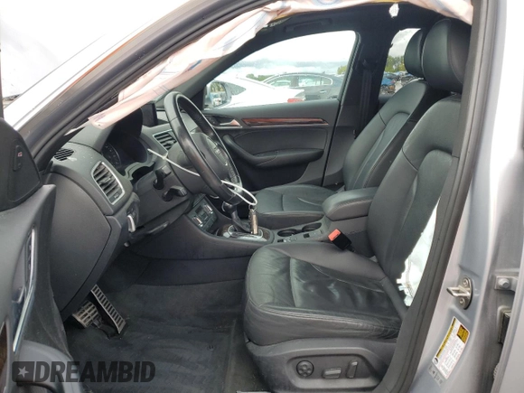 2015 Audi Q3 Prestige with VIN WA1GFCFS7FR012524, listed as a Copart auction lot 72800324 with 131,261 mi miles and Salvage title. Bid and sale history available at DreamBid. Image 7.
