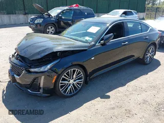 2024 Cadillac CT5 Premium Luxury with VIN 1G6DT5RK2R0131439, listed as a IAAI auction lot 42129787 with 1,801 mi miles and . Bid and sale history available at DreamBid. Image 2.